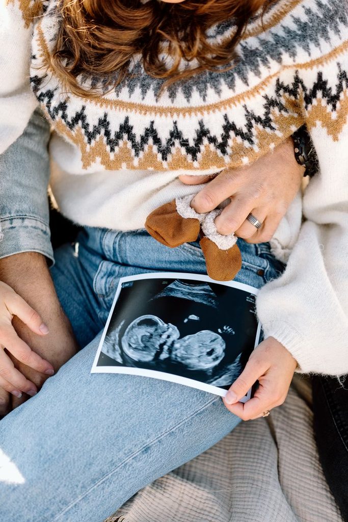 Detail photos of sonogram during a pregnancy announcement photoshoot at Lake Hawea, New Zealand.
